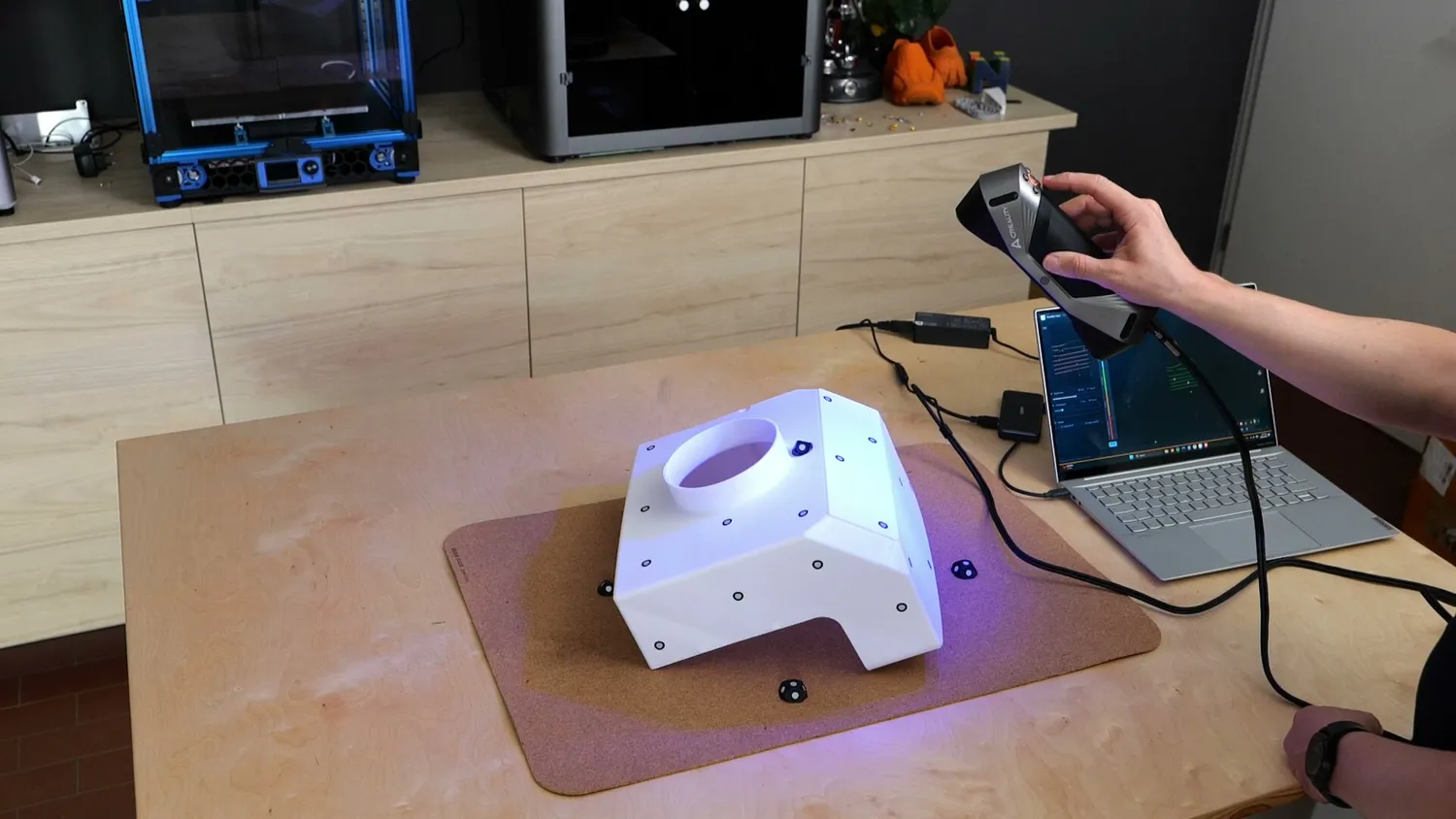 3D printed air intake cover being scanned with the CR-Scan Raptor
