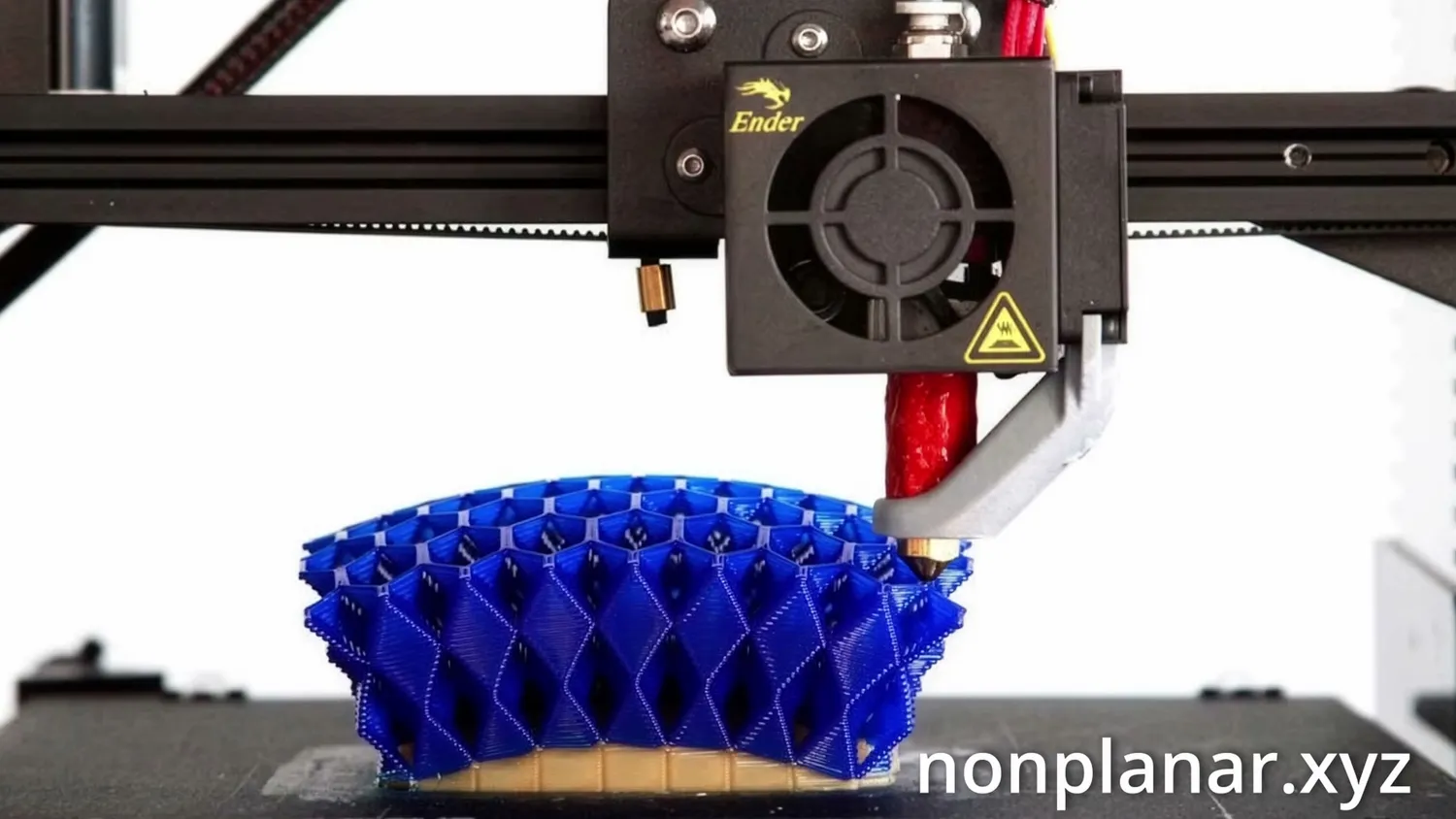 Non-planar print of a curved honeycomb surface on an Ender 3