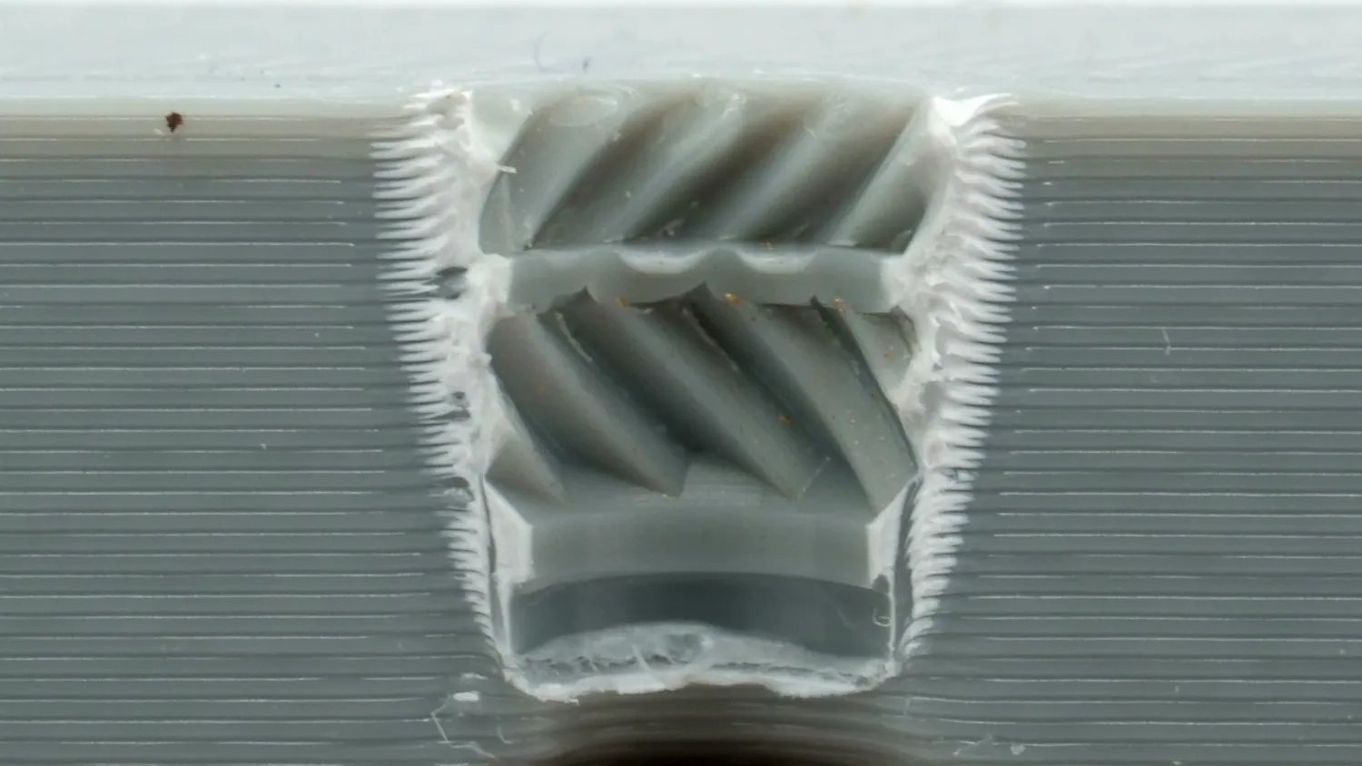 Plastic showing the imprint of the insert knurling after pull-out