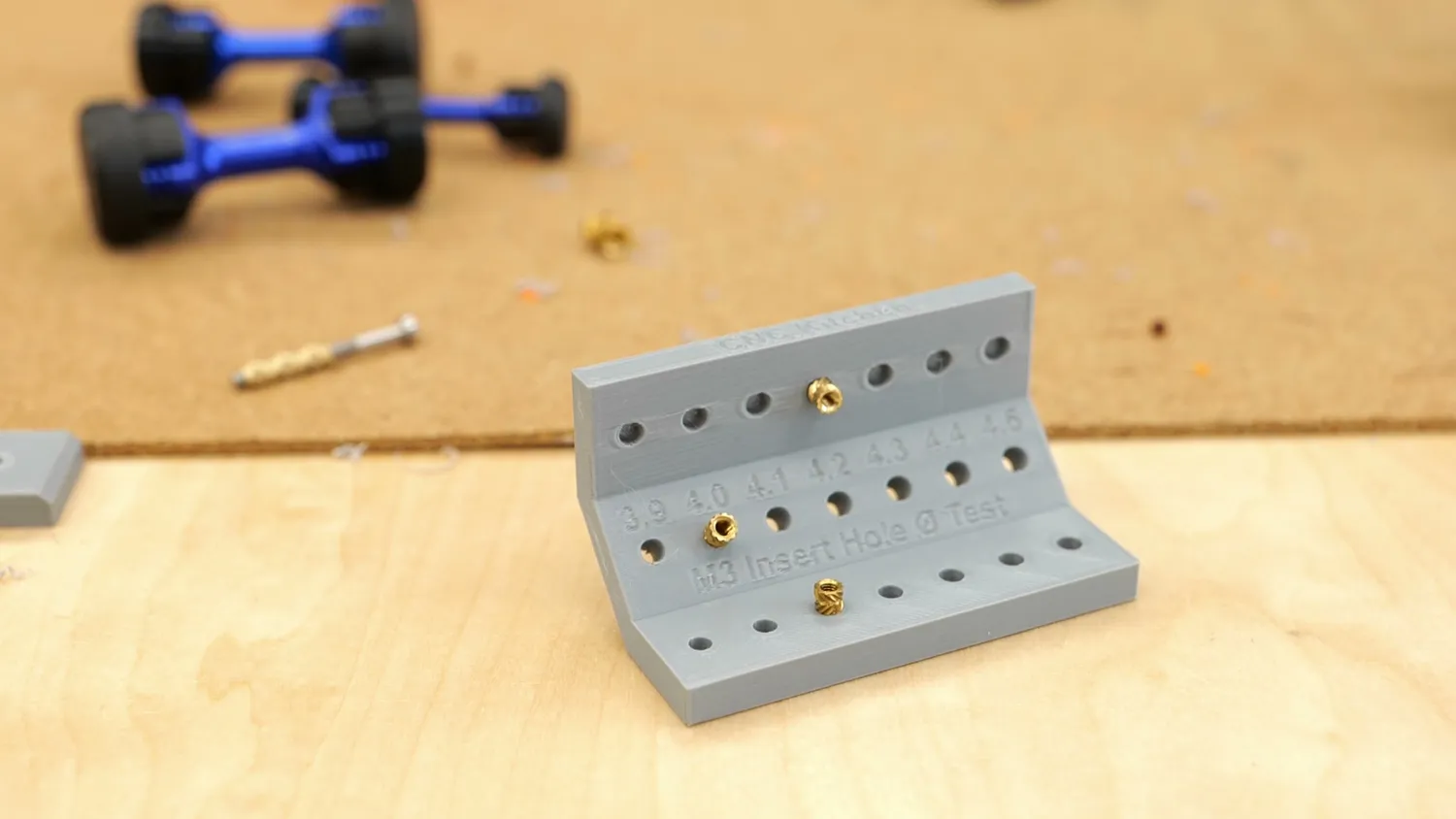 Calibration part with horizontal, vertical and angled insert holes