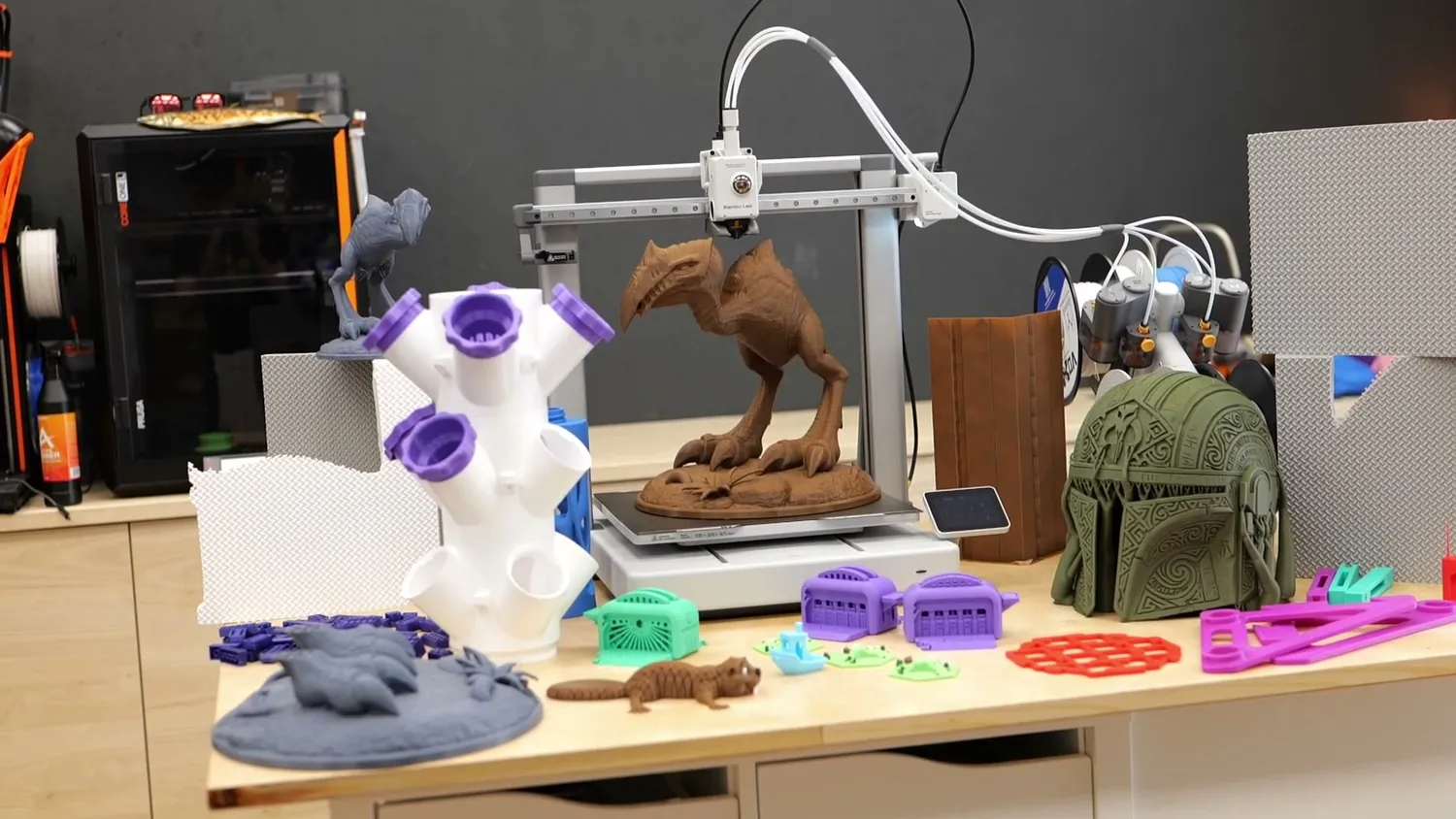 A workbench full of parts printed on the A2L during testing