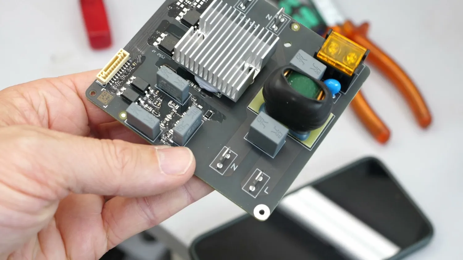 The A2L's AC board held in hand, without an NTC thermistor