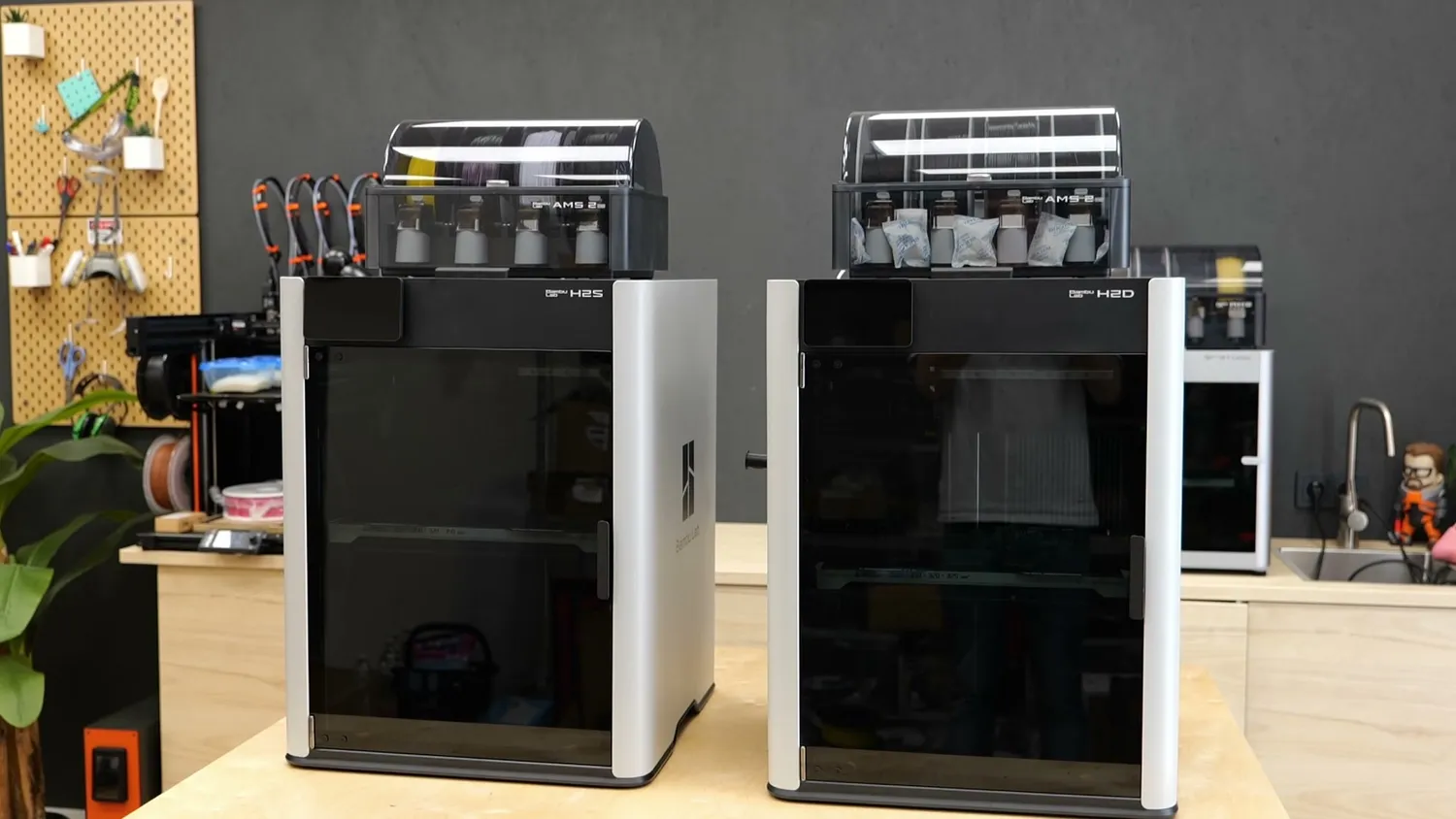 The Bambu Lab H2S next to the H2D