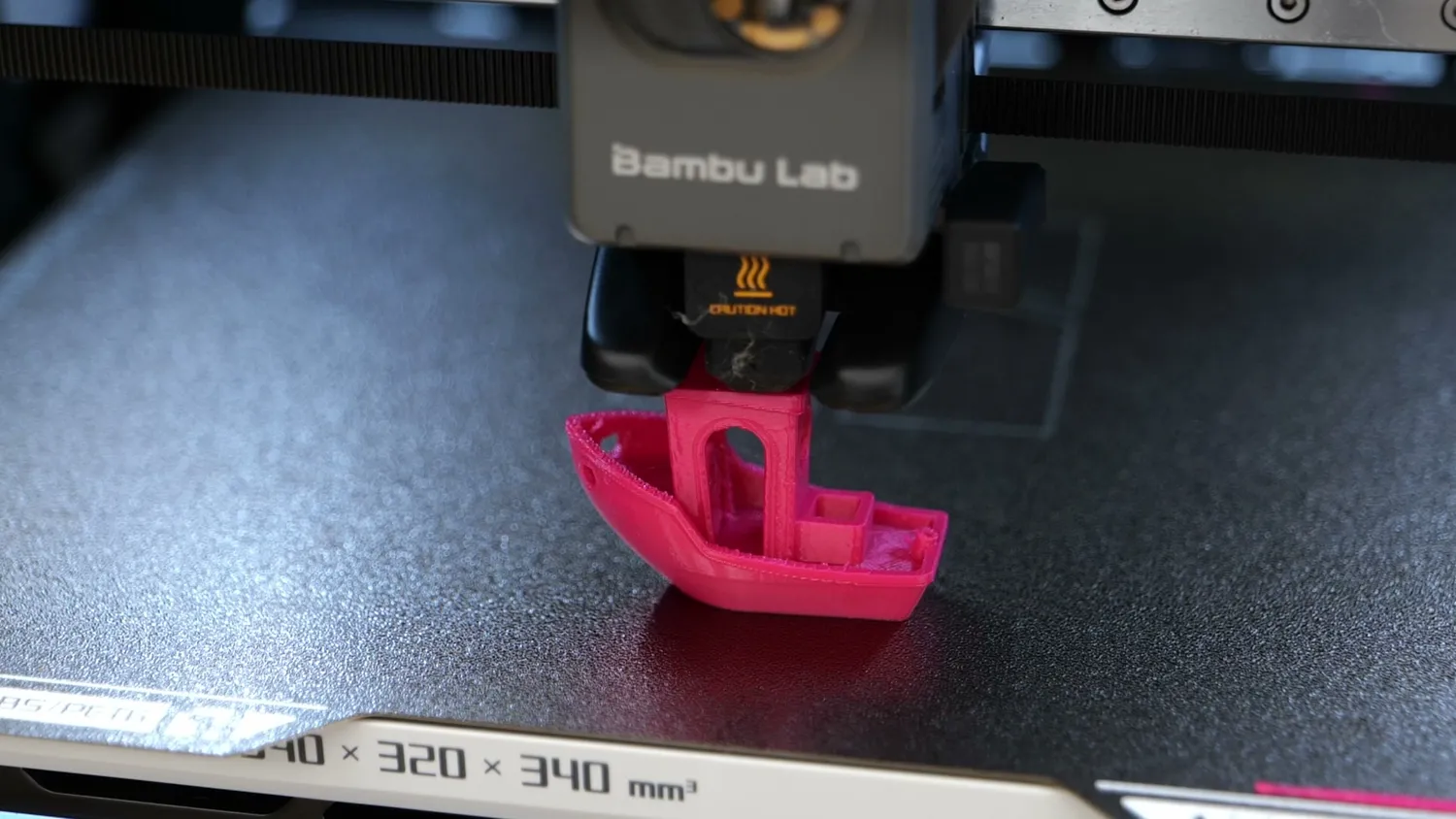 A pink 3DBenchy in TPU printing on the H2S