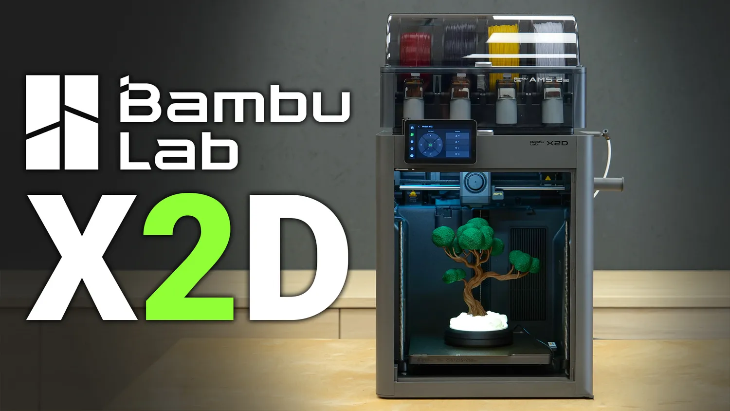 Bambu Lab X2D with AMS 2 Pro printing a two-color bonsai tree