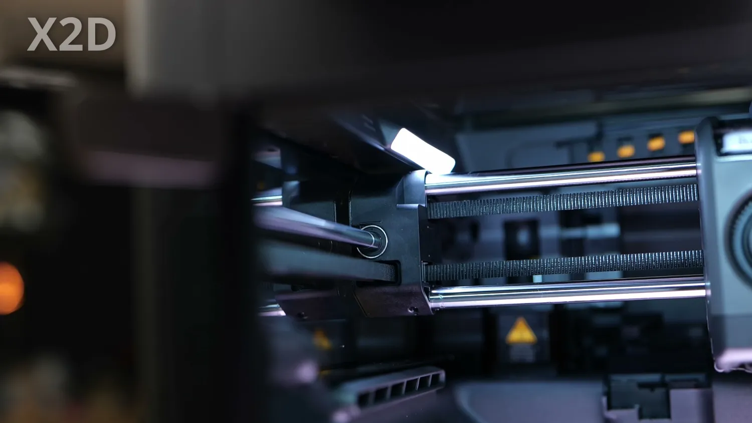 Hollow steel rods carrying the printhead of the Bambu Lab X2D