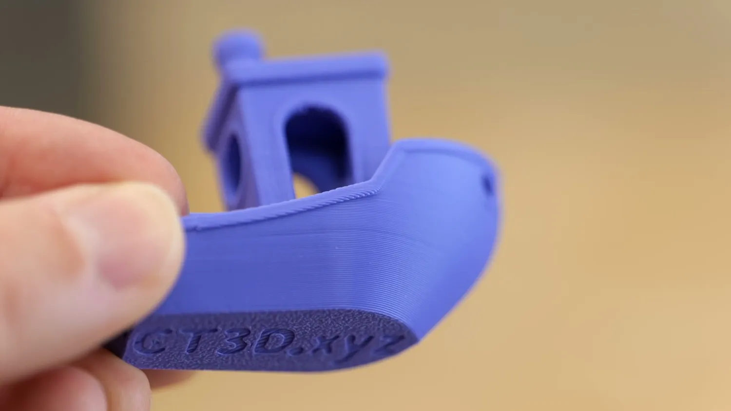 Close-up of the hull of a blue 3DBenchy printed on the X2D