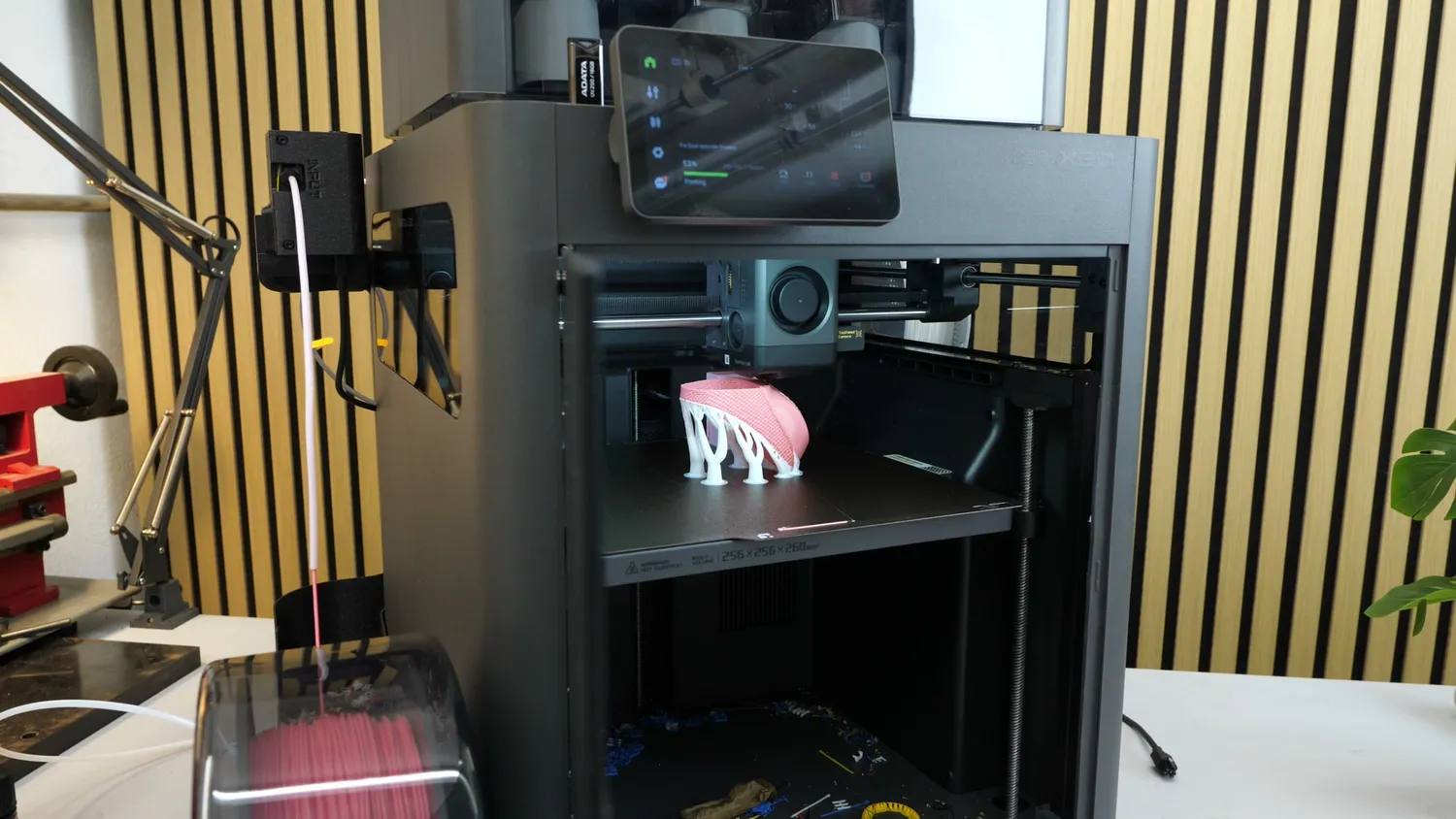 A TPU shoe printing on the X2D with white PLA supports