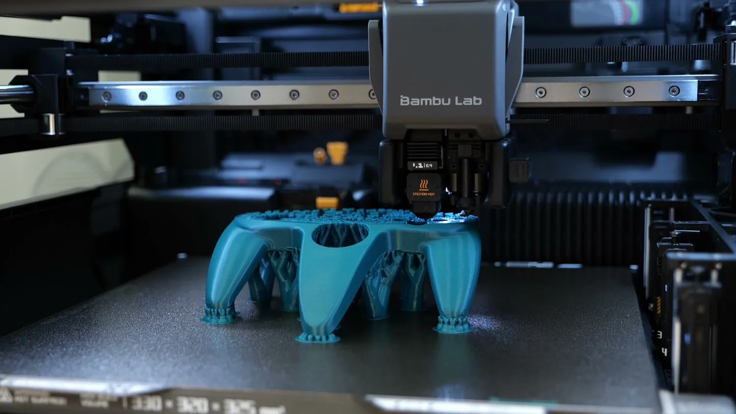 A 3D printer printing a copy of the controller shell