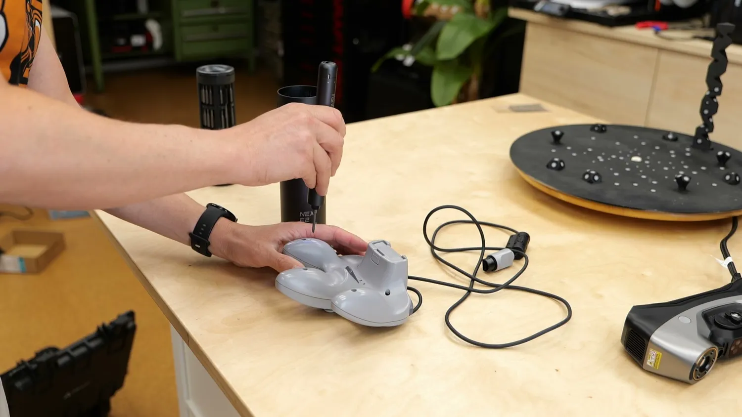 Unscrewing the N64 controller shell