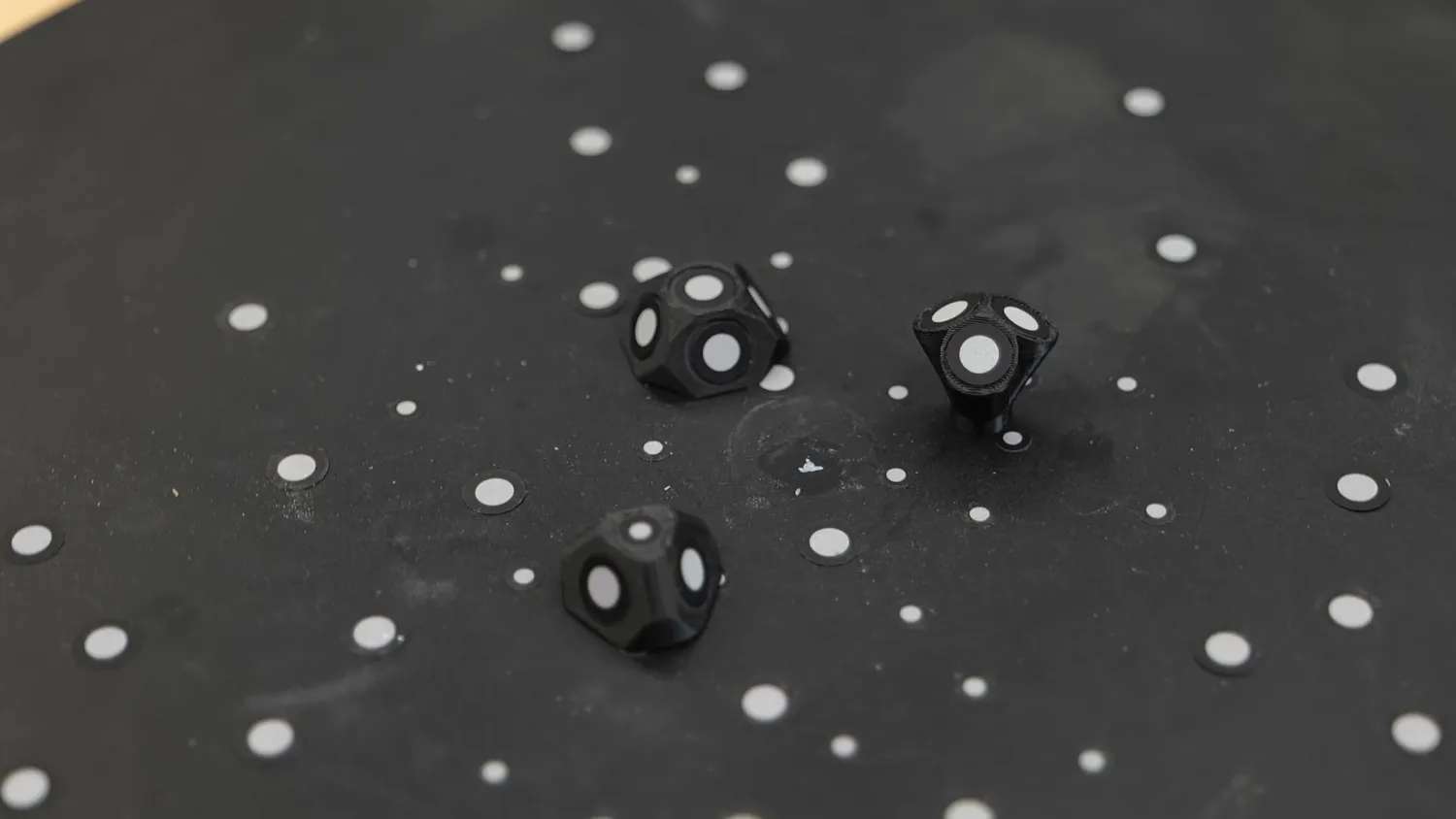 3D-printed marker targets on the black turntable