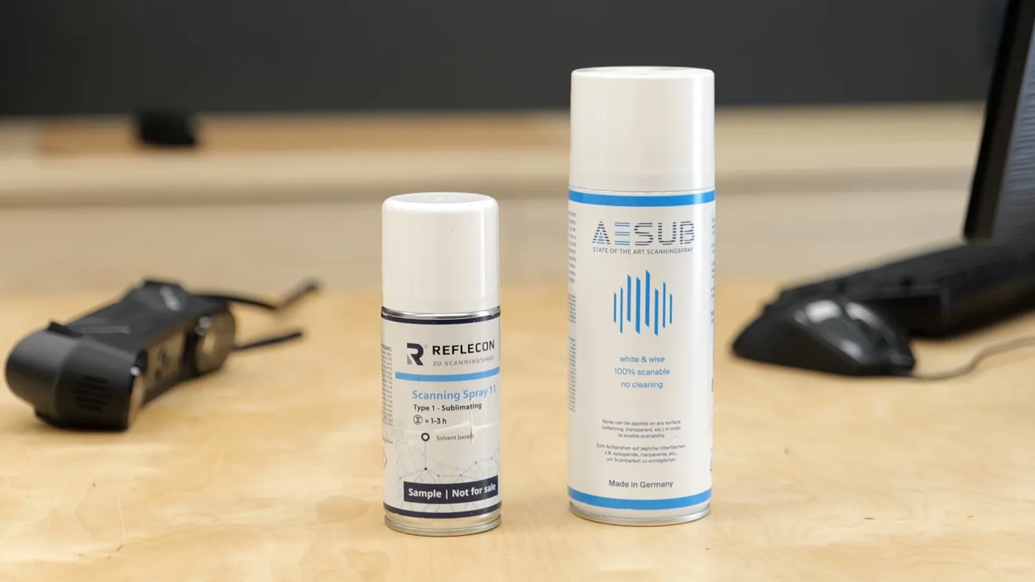 Two cans of vanishing 3D scanning spray