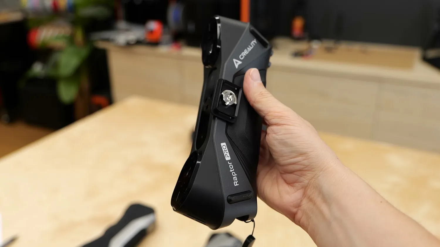 The grip and phone mount from the side