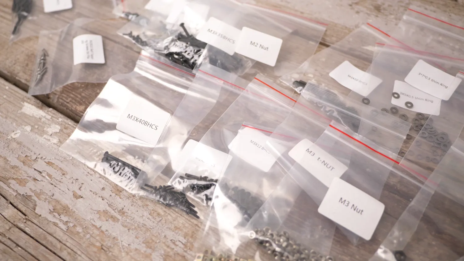 Fasteners bagged and labelled by size, down to M3 t-nuts and shim rings