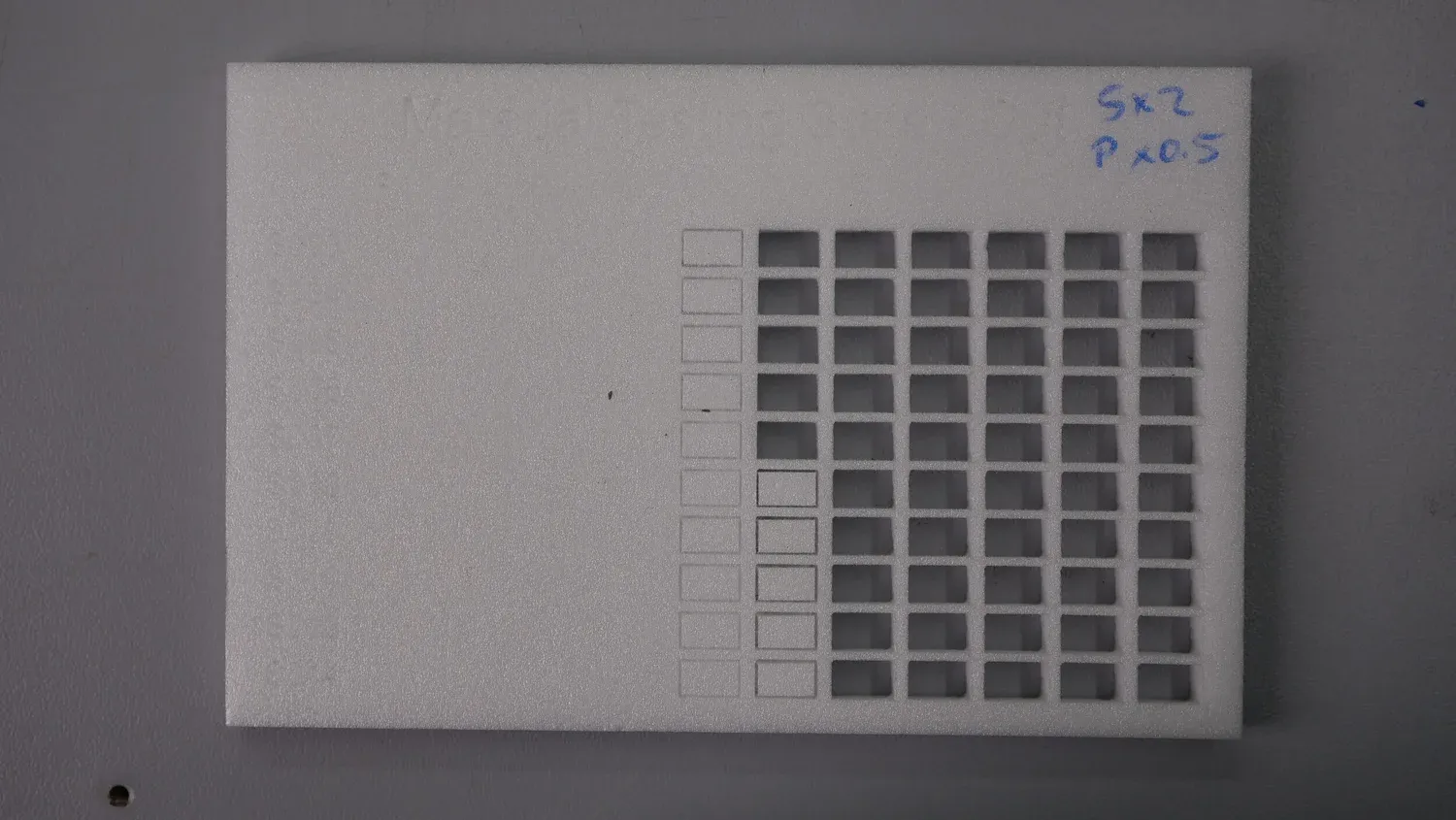 White Depron foam board marked S x2, P x0.5, cut cleanly across the whole right-hand block