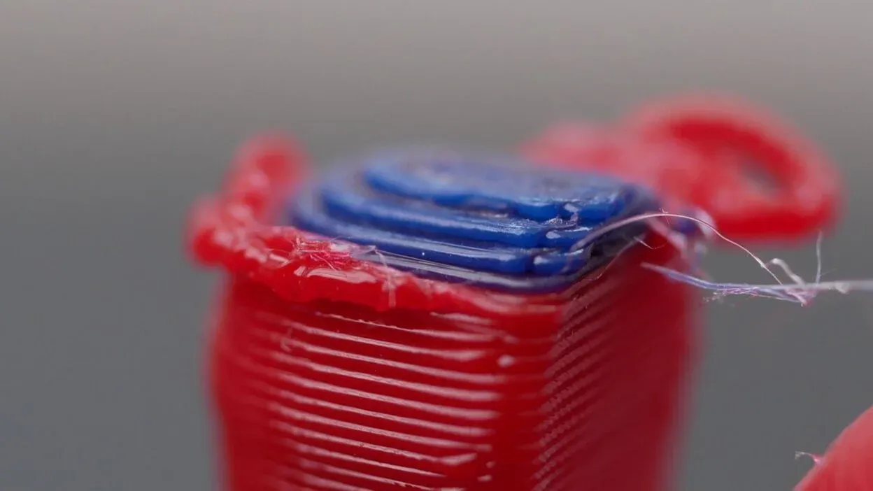 Over-extrusion at resuming location