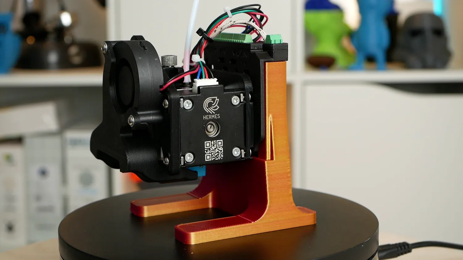 The Hermes extruder mounted on a printed test stand