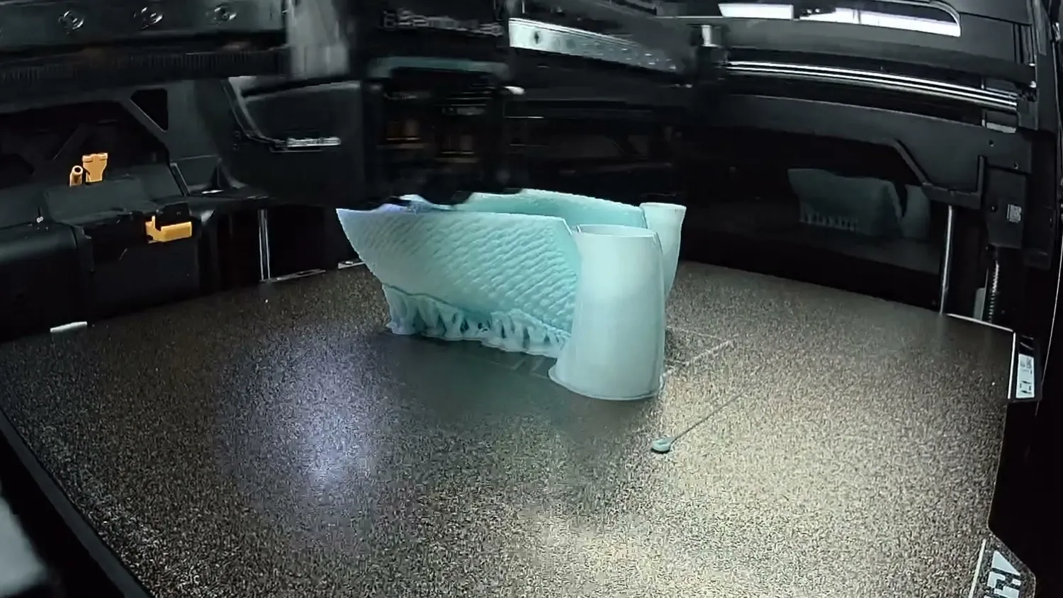The bike saddle printing with under-extruded TPU on the Bambu Lab H2D