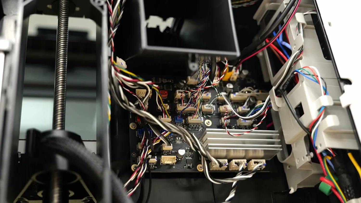 The electronics behind the side panel of the Bambu Lab H2D