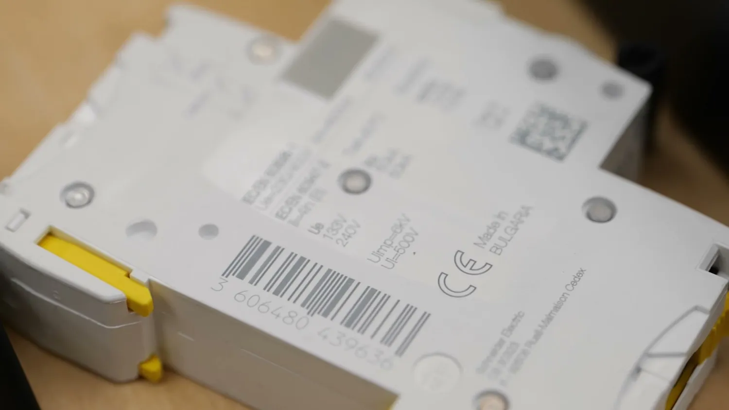 Laser marked type label and barcode on an injection molded circuit breaker
