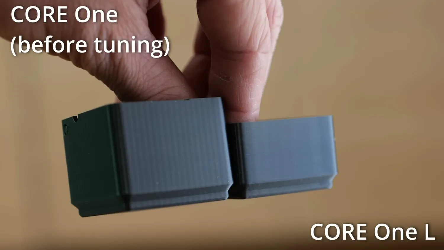 Two printed blocks held side by side, the left one showing a visible surface ripple the right one does not