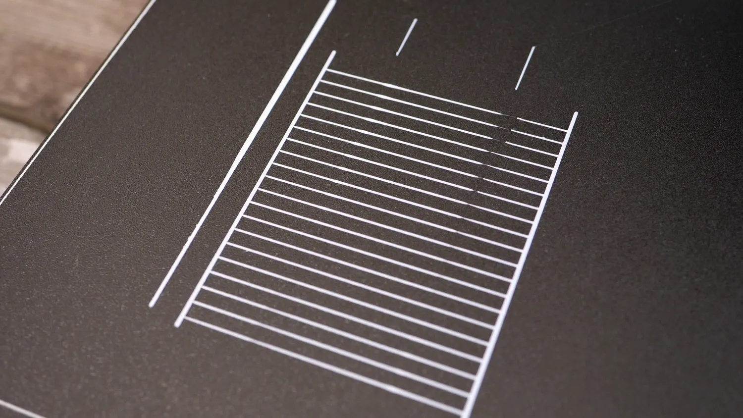 The Marlin K-factor calibration pattern printed on the bed, with M900 K swapped for RepRapFirmware's M572 D0 S