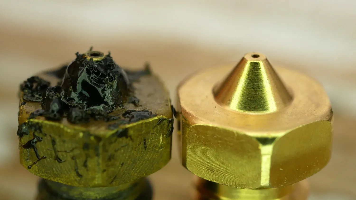  Brass nozzle after ~200g of Carbon Fiber PC Blend (left) and new nozzle (right) 