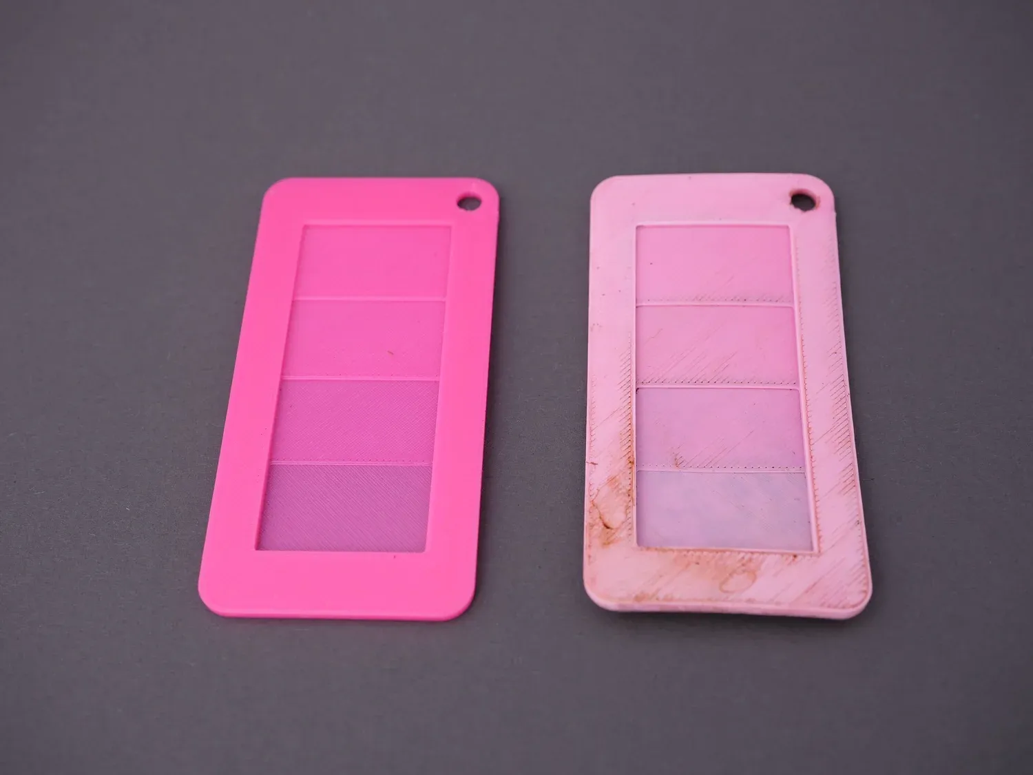 The pink degradation card beside its reference: bleached and stained, but the thin sections all survived