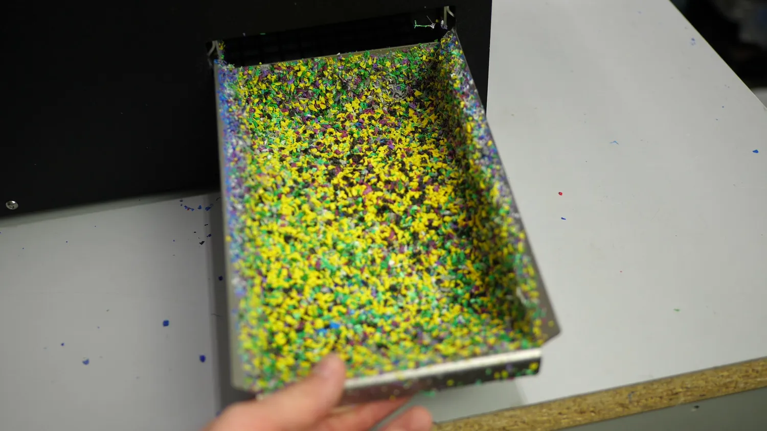 Tray of shredded material