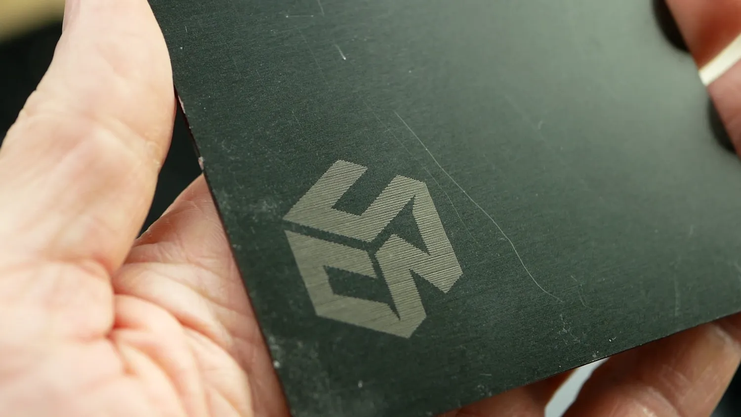  Laser-etched anodized aluminum 