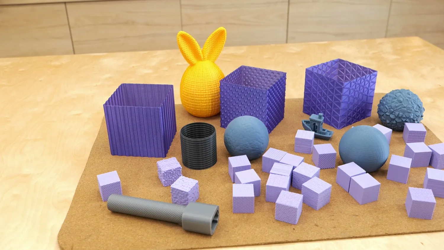Overview of all the textured test prints on a desk