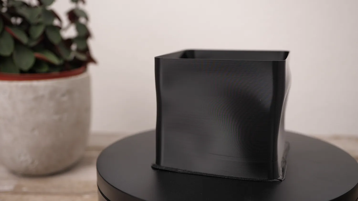 In black PETG the sides have buckled right in
