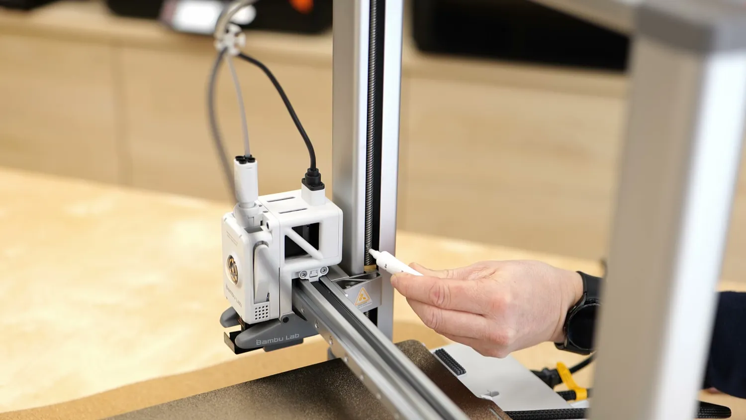 Greasing the Z lead screw of a 3D printer