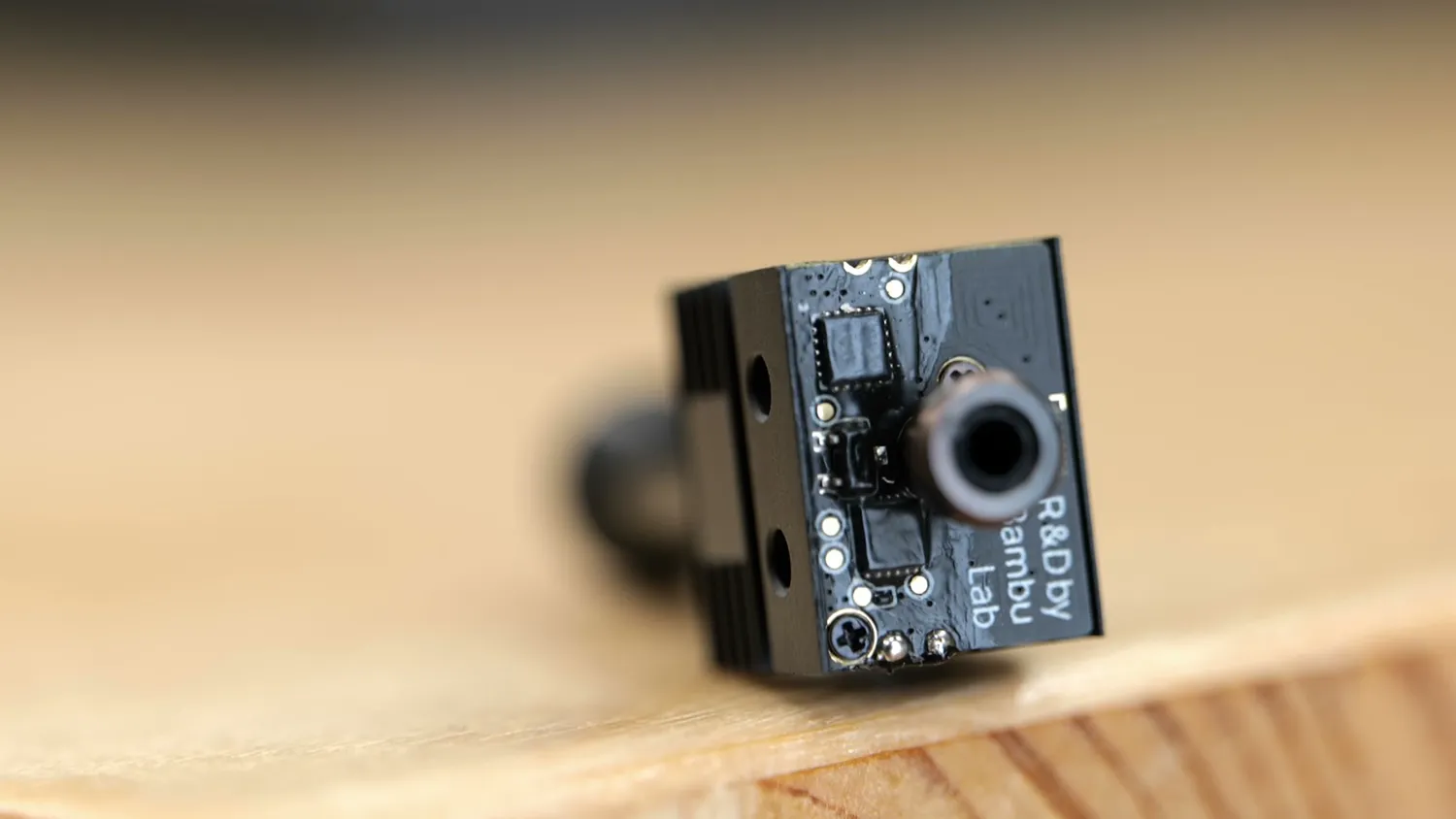 Induction hotend standing upright with its PCB on top