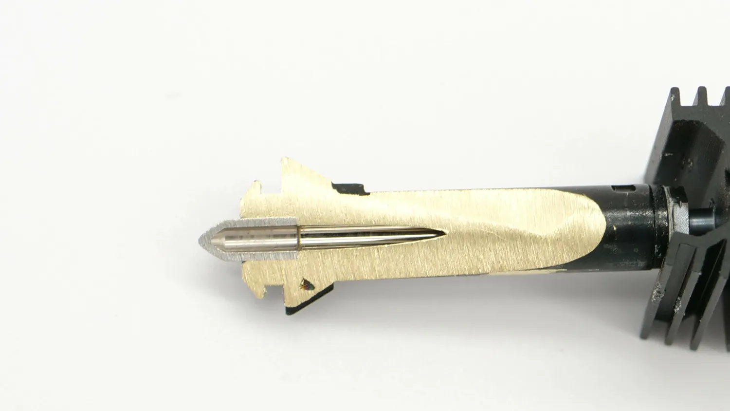 Induction hotend sanded open, showing the brass body and steel tip
