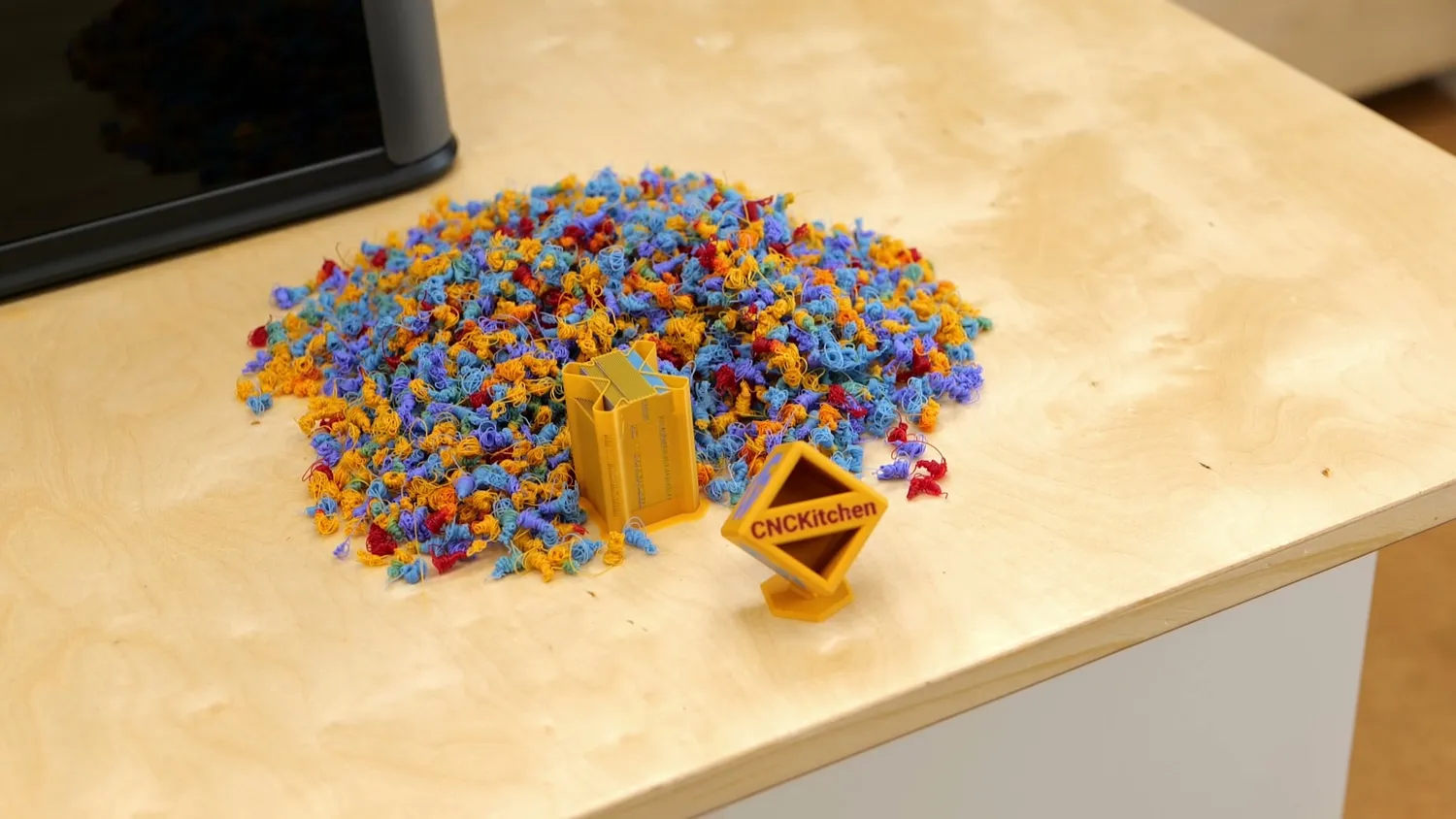 The P2S result: the 28 g print next to a heap of over 320 g of purge poops in four colours