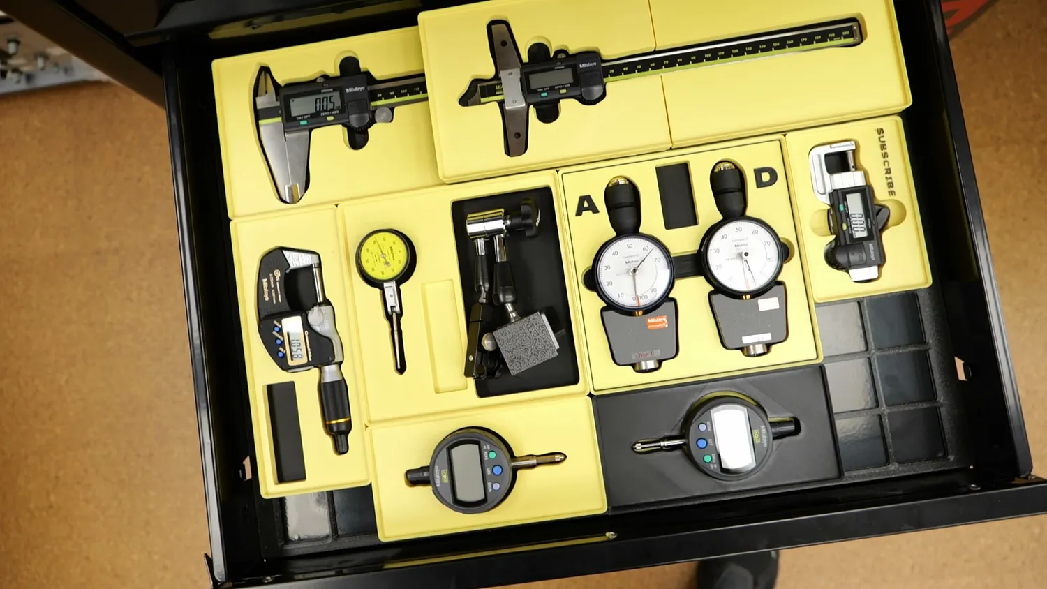 Finished drawer with Mitutoyo tools in yellow and black Gridfinity bins