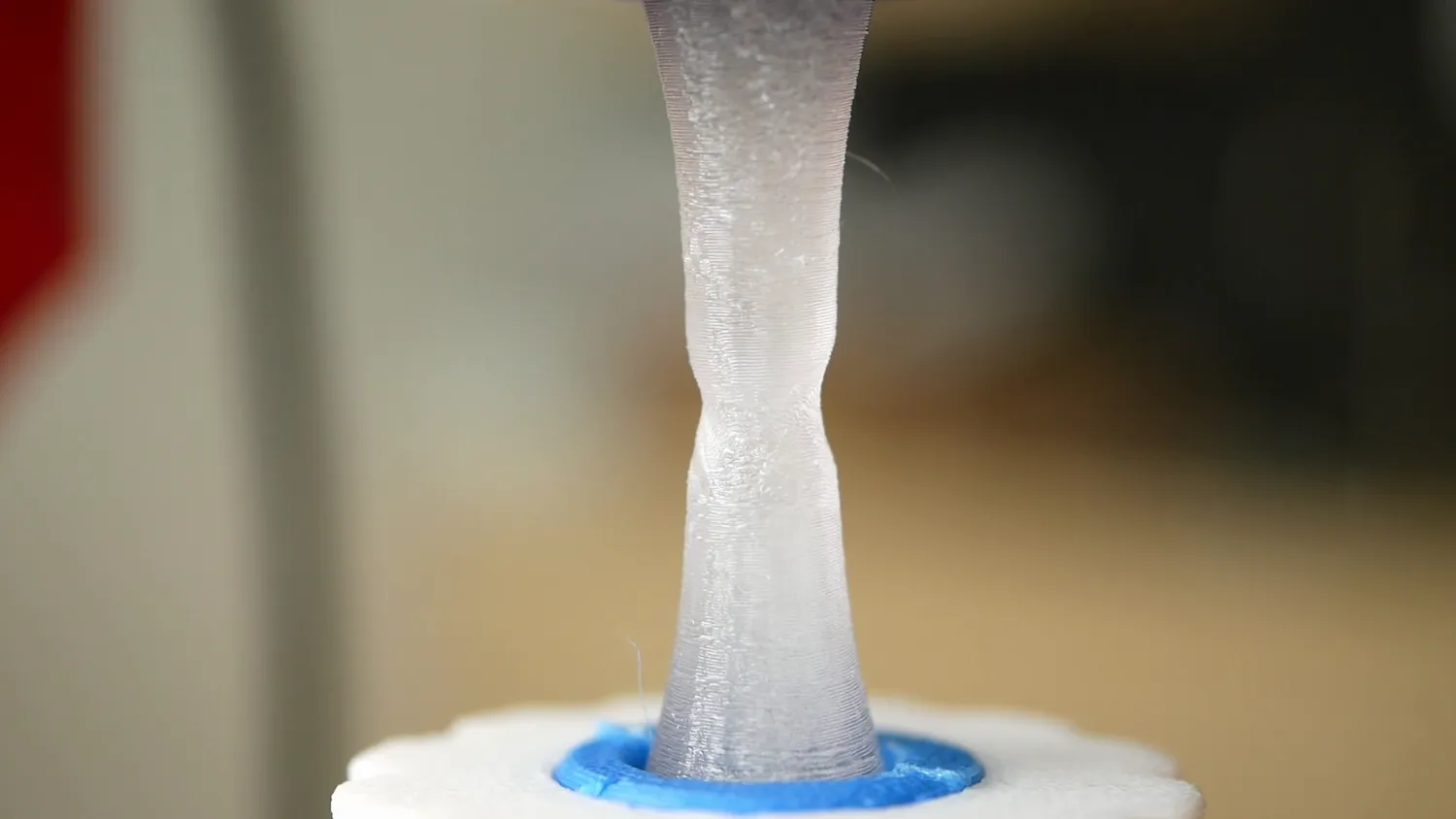 Necking of a layer adhesion sample