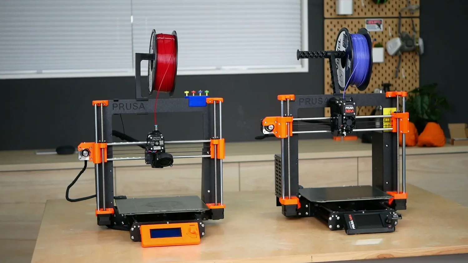 Prusa MK3 and MK4 standing next to each other