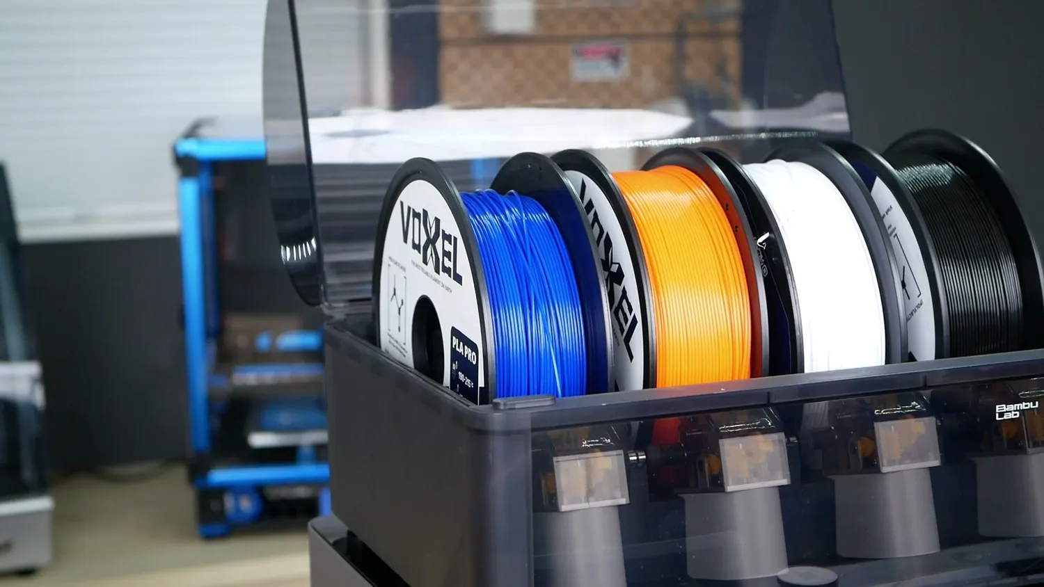 Four filaments loaded in the Bambu Lab AMS