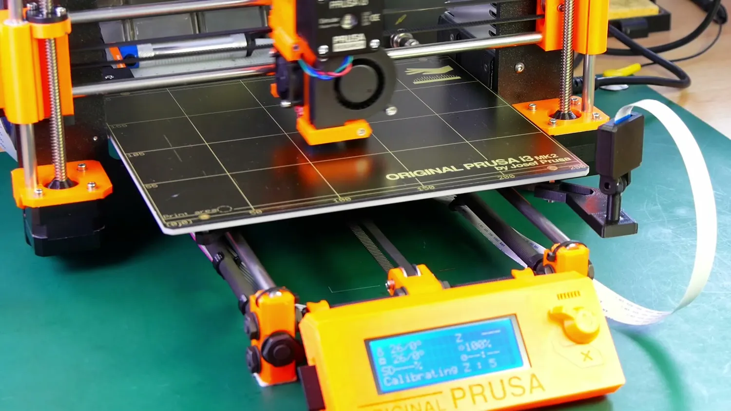 The original orange Prusa i3 MK2 calibrating